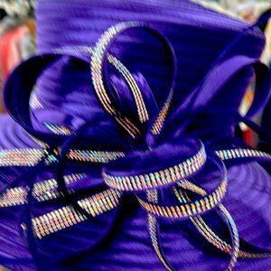 Beautiful Hat to dress up with any occasion. 100% polyester n made in China